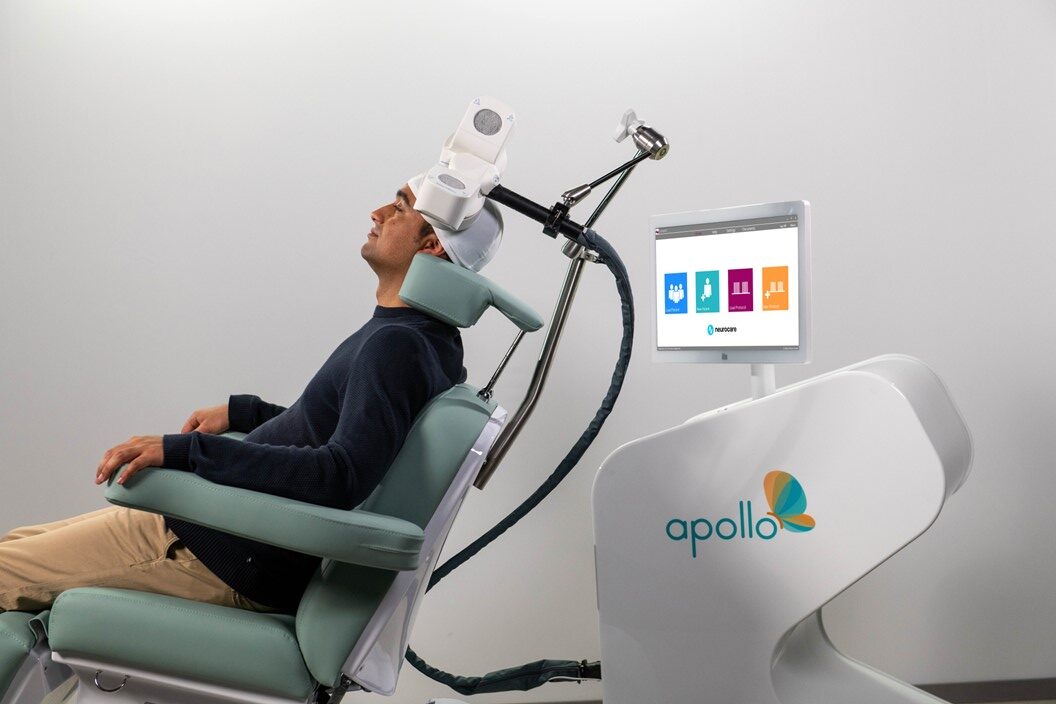 Man receiving treatment in Apollo chair.